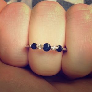 Blue and white sapphire white gold ring